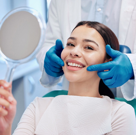 a close-up of a dental patient smiling