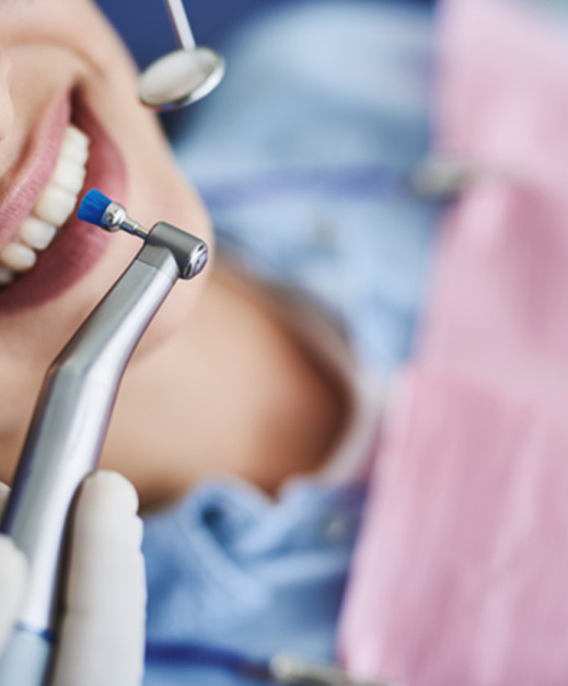 a dental patient receiving a teeth cleaning