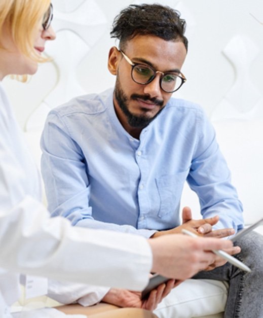 Dentist discussing dental crowns in Columbus