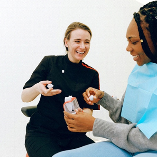 Woman at consultation for dental crowns in Columbus