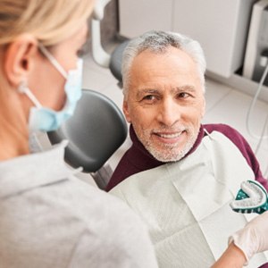 : A patient taking dental impressions for dentures