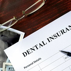 Dental insurance form sitting on top of a desk