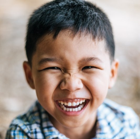 Smiling young patient after children's dentistry visit