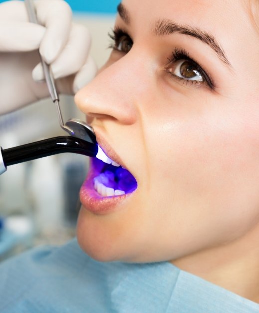 Patient receiving cosmetic dental bonding