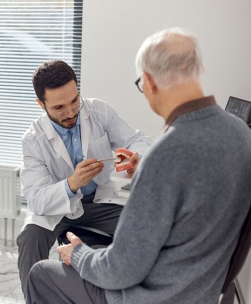 Dentist and patient talking during consultation