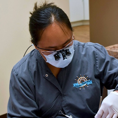 Columbus dental team member treating dental patient