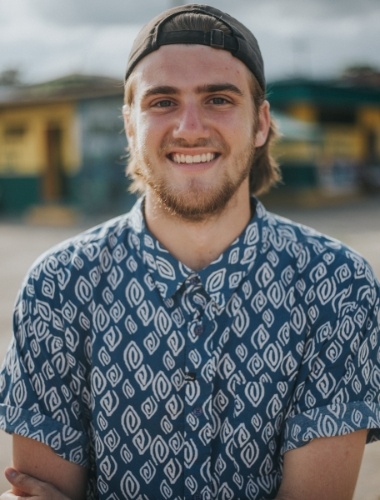 Young man with healthy smile after emergency dentistry