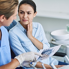 Patient in Columbus asking about extraction over a root canal