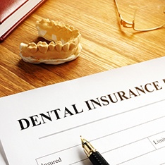 Patient in Columbus checking dental insurance for a root canal