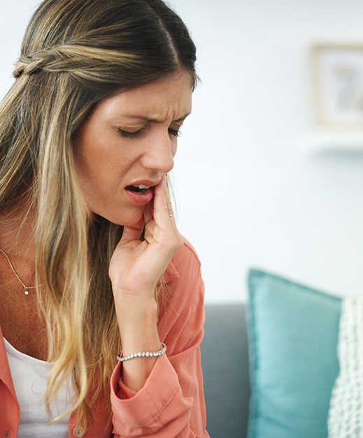 Woman experiencing dental pain