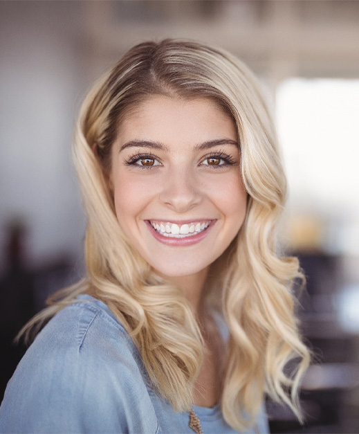 woman smiling after teeth whitening in Columbus