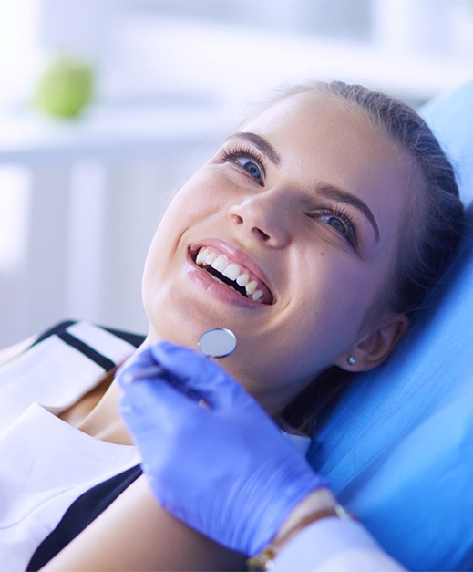 woman smiling after getting teeth whitening in Columbus