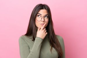 young woman with puzzled look 