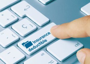 “Insurance deductible” key on computer keyboard
