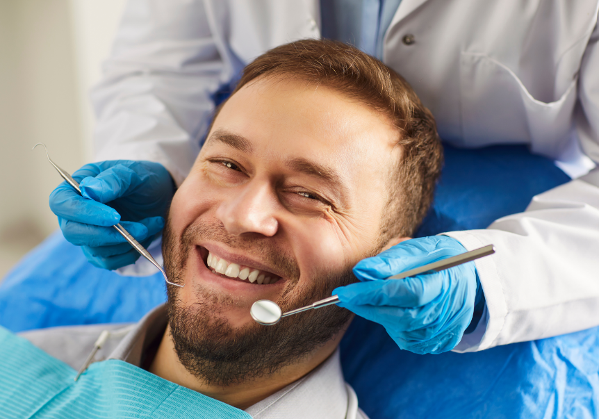 Man smiling in dentist chair