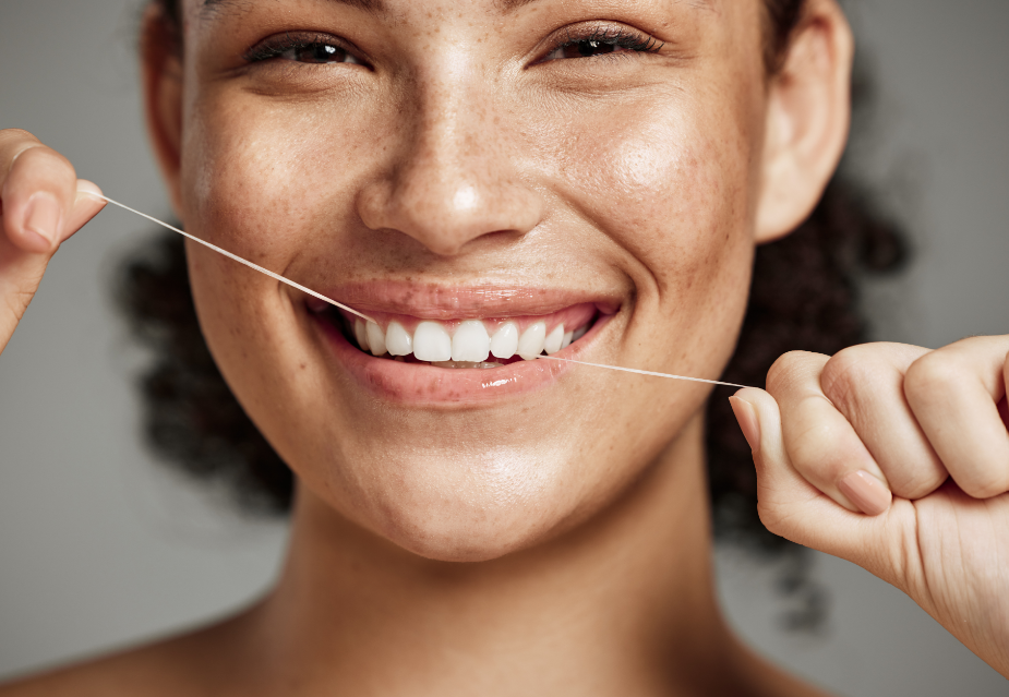 Woman flossing